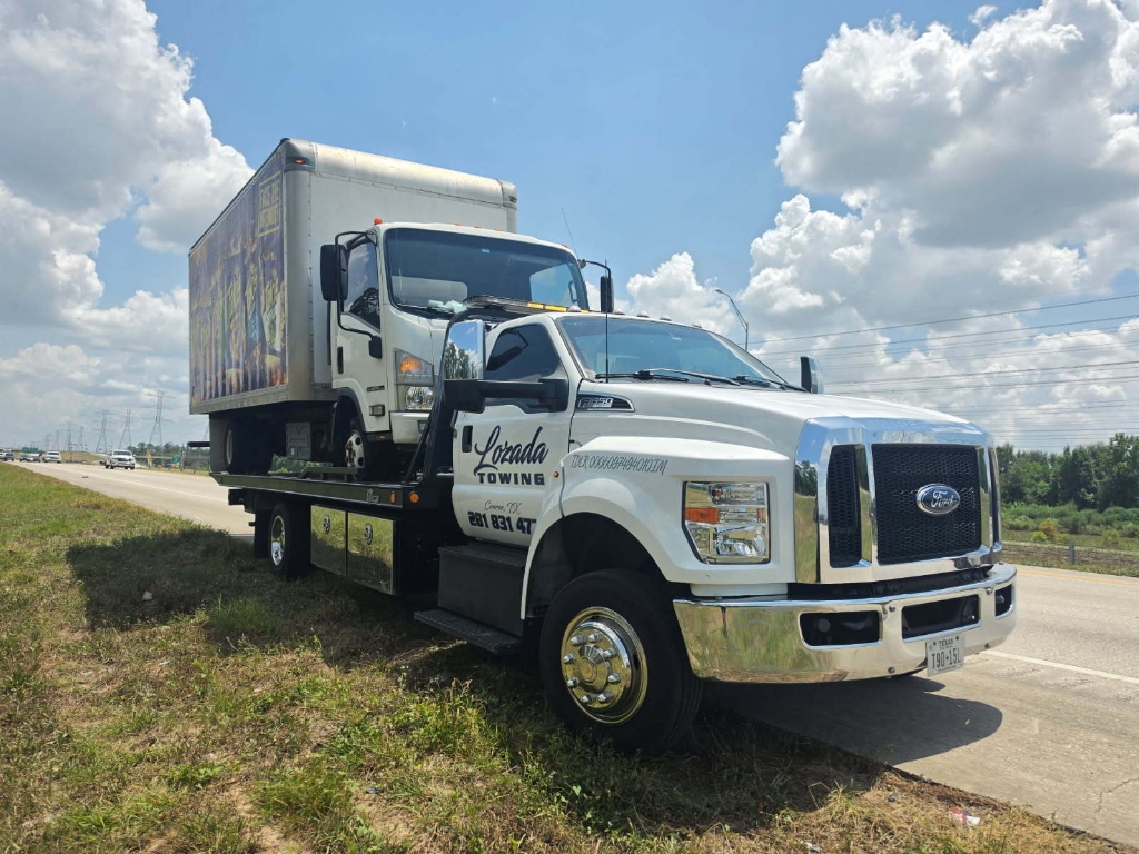 Sedan flatbed transport at AutoZone location